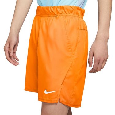 orange tennis shorts